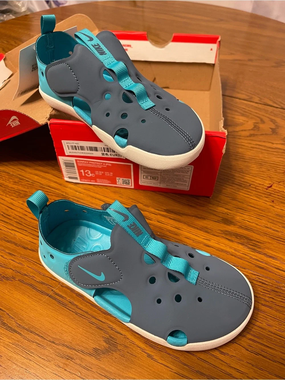 Nike Kids' Sunray Protect 4 (PS) thunderstorm/dusty cactus sail